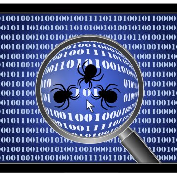 registry reviver registry software review magnifying glass over blue display with binary code 0 and 1 black bugs 